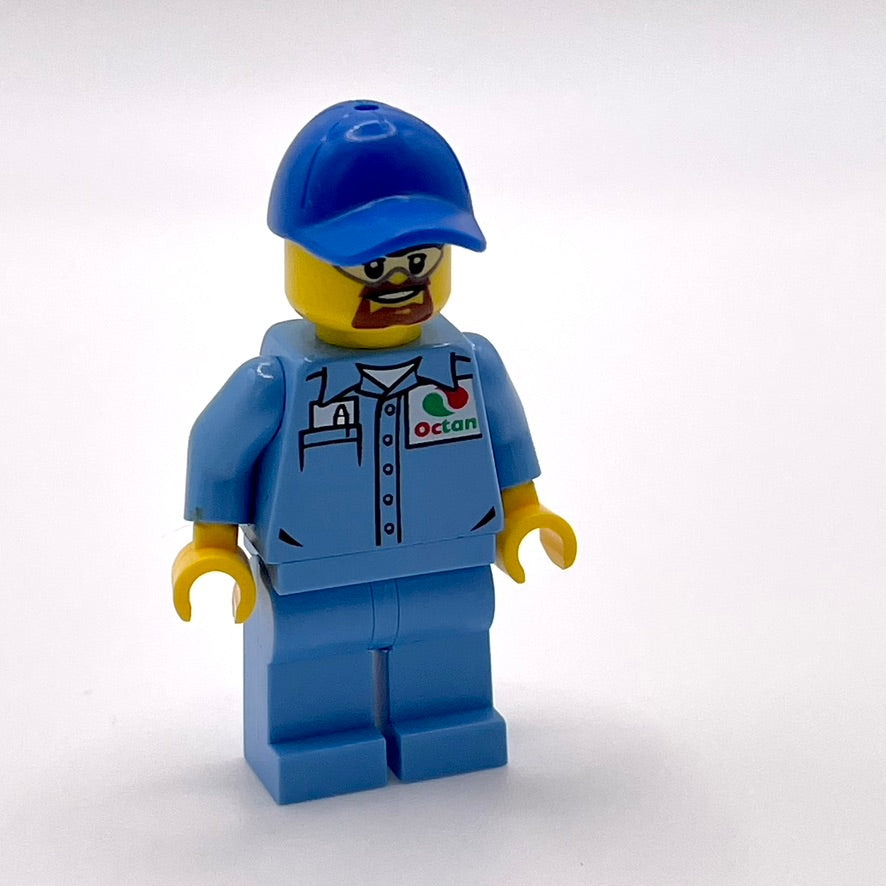 Medium Blue Uniform Shirt with Pocket and Octan Logo, Medium Blue Legs, Blue Short Bill Cap, Goatee